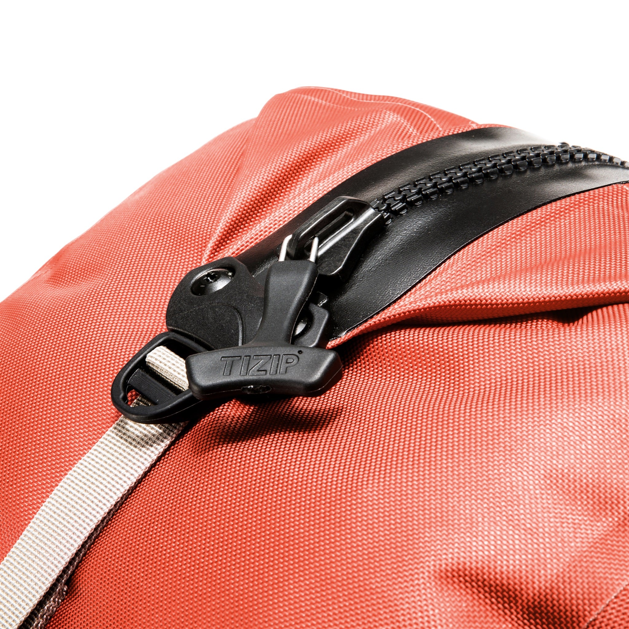 Detail view of the waterproof ORTLIEB Atrack outdoor backpack in rooibos color with 25 liters volume, featuring a robust TIZIP zipper for reliable protection against moisture and dust.